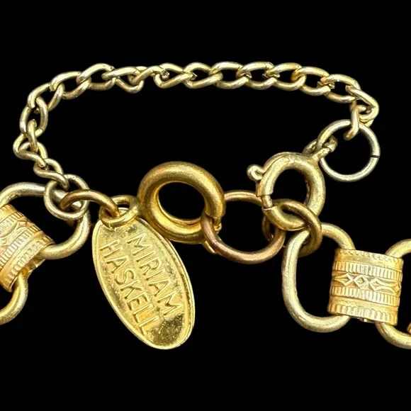 Signed MIRIAM HASKELL Book Chain Charm Bracelet Gilt Gold Tone Heart Flower Bow - Picture 2 of 6